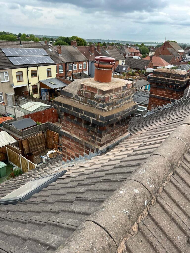 This is a photo taken from a roof which is being repaired by Swanley Roofing Repairs, it shows a street of houses, and their roofs